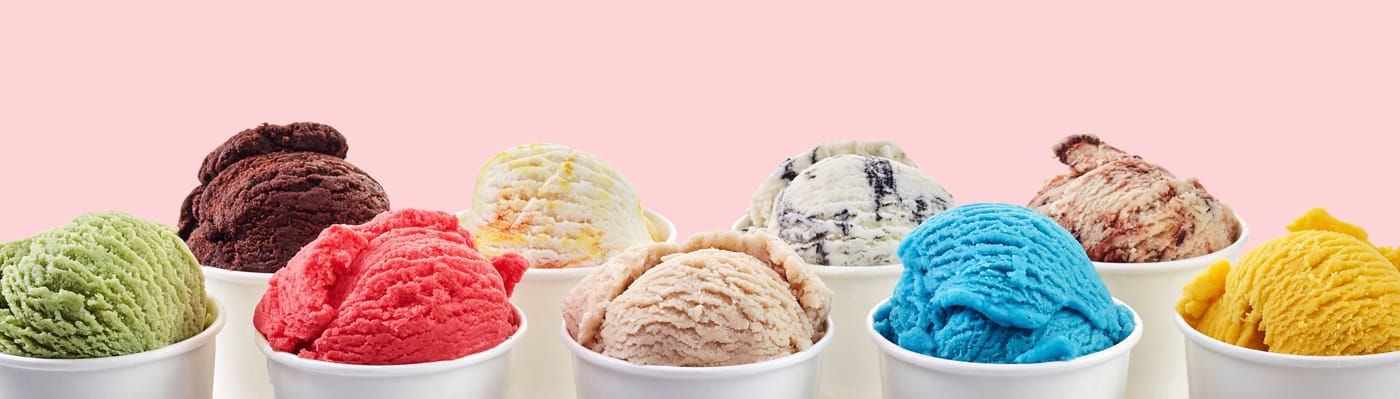 Madyson Silvagnoli owner of Maddy's Ice Cream and More handing out free scoops to children in Gardner Massachusetts