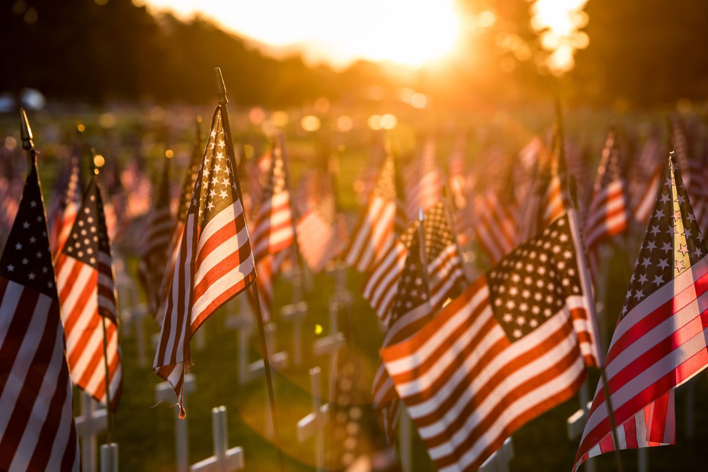Memorial Day 2026 American flag cemetery flowers tribute fallen soldiers