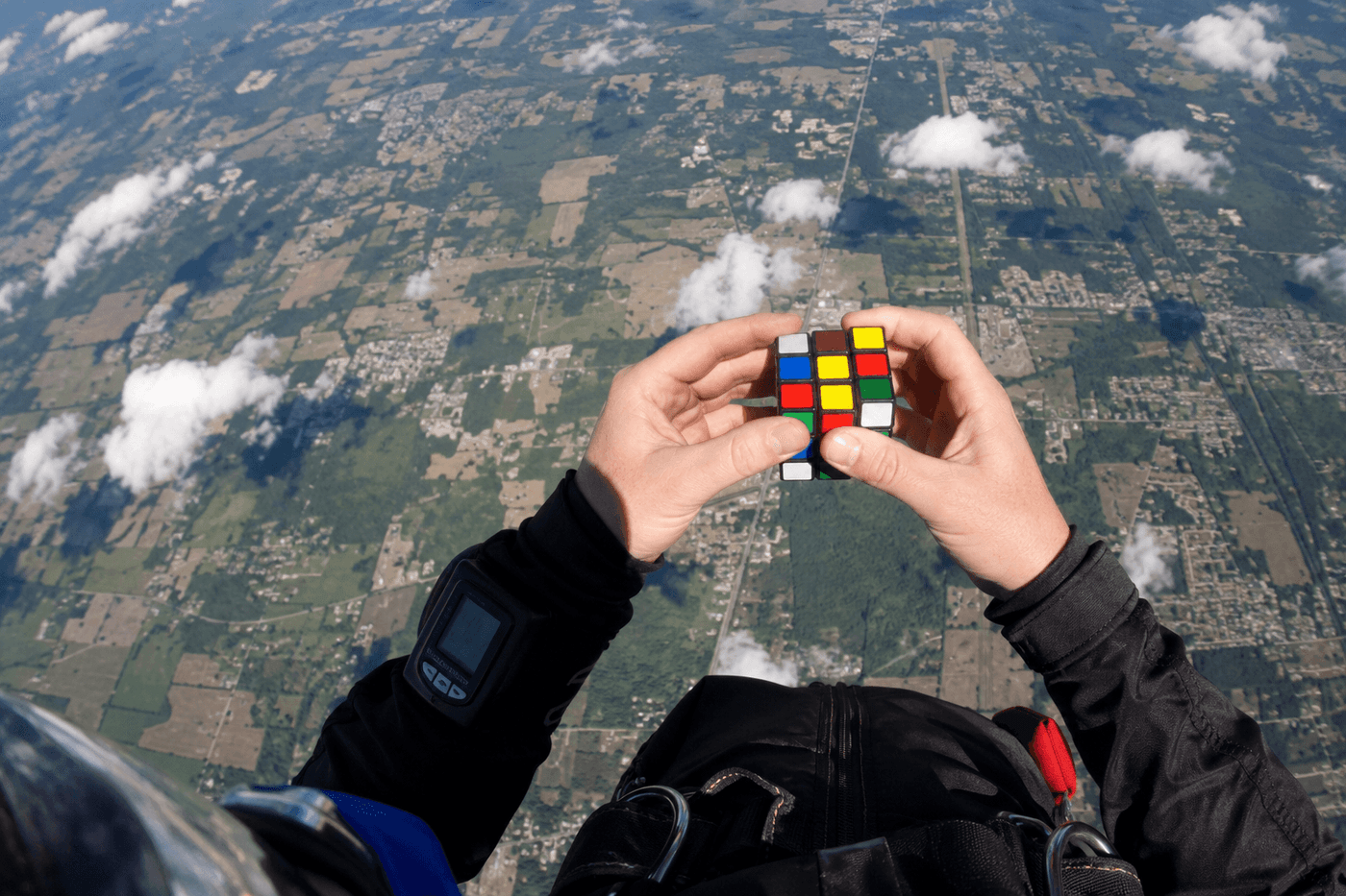 Ishaan Hadkar solves Rubik's cubes while skydiving first ever skydive Guinness World Record Oceanside California