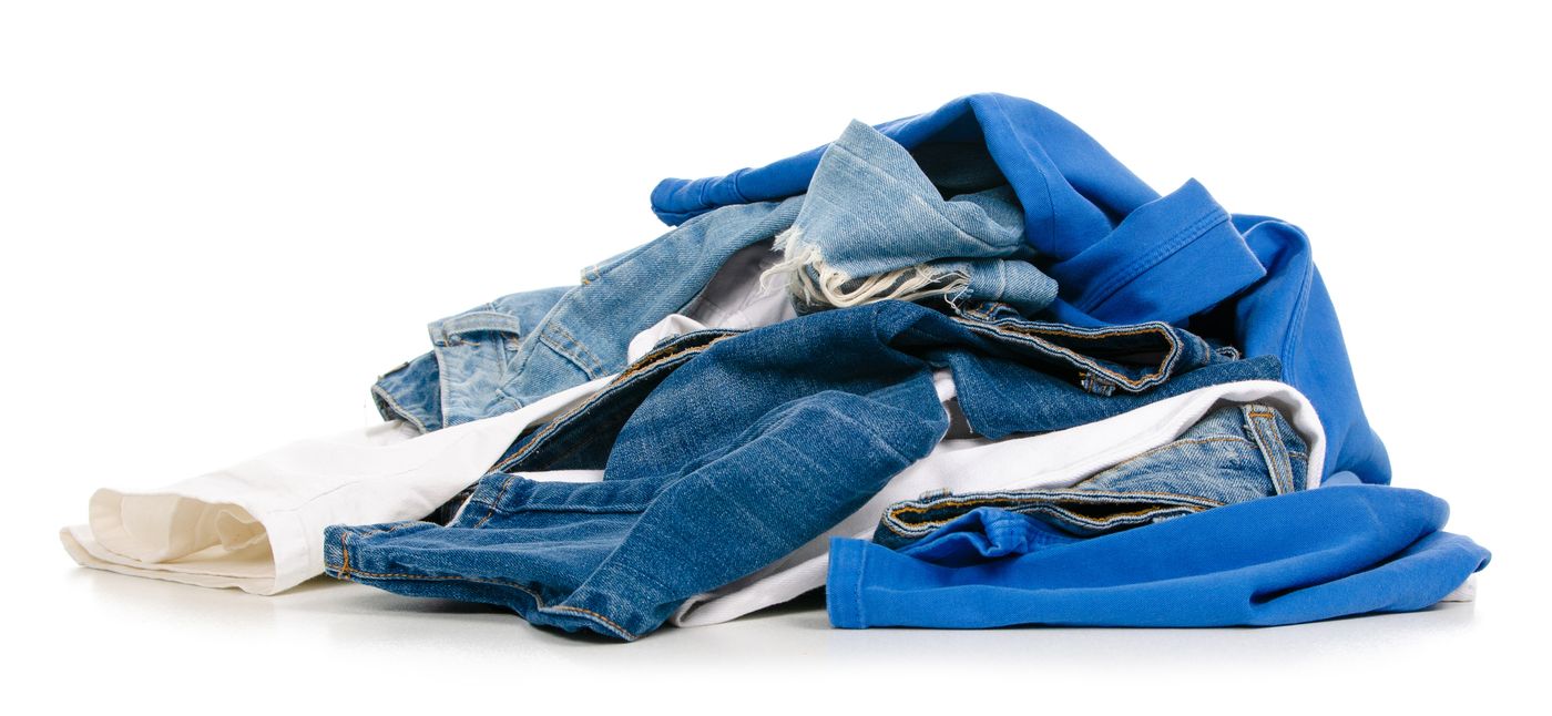 A pile of discarded unsold clothing