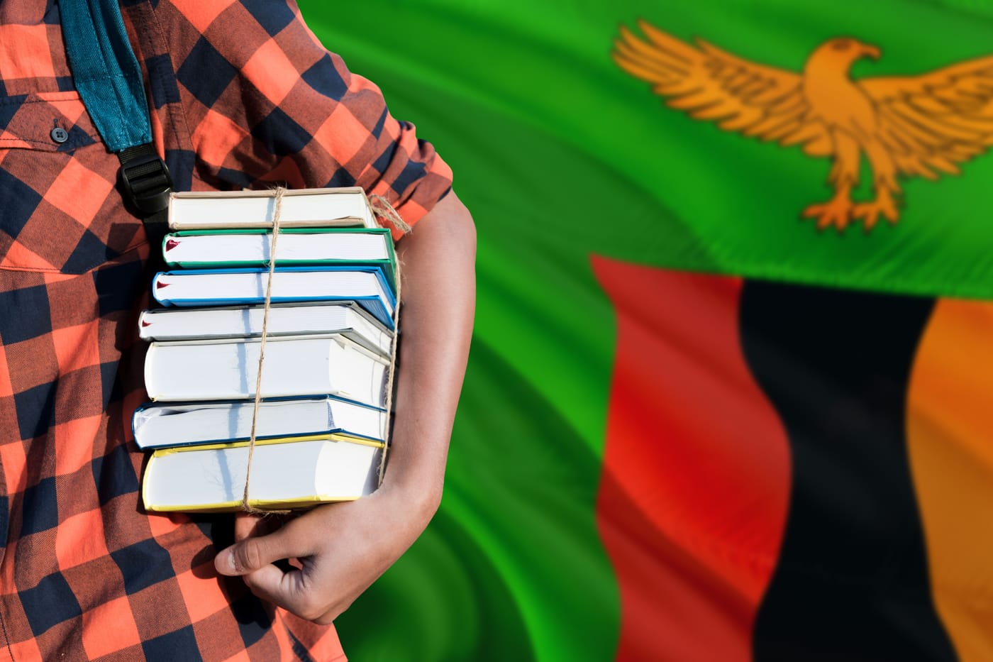 Zambian President Hakainde Hichilema signing the free education bill into law making Zambia the first country in its region to enshrine free public schooling as a legal right