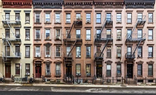 This Artist Covered Rent For His Grandmother's Building