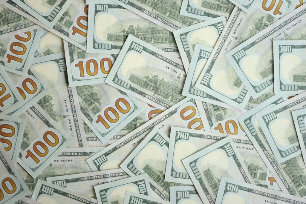 Stack of money representing MacKenzie Scott's 70 million dollar donation to Meals on Wheels America